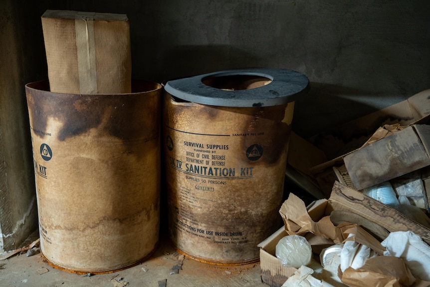 Dusty medical and sanitary supplies in an abandoned fallout shelter