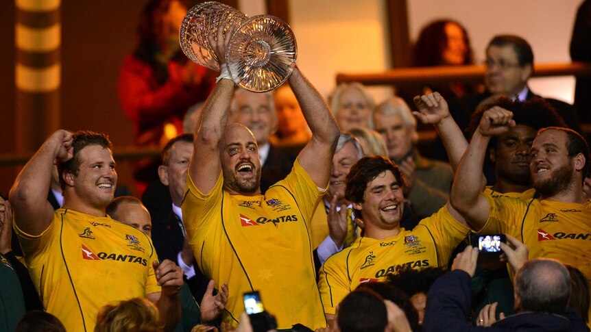 Twickenham glory ... Wallabies captain Nathan Sharpe lifts the Cook Cup.