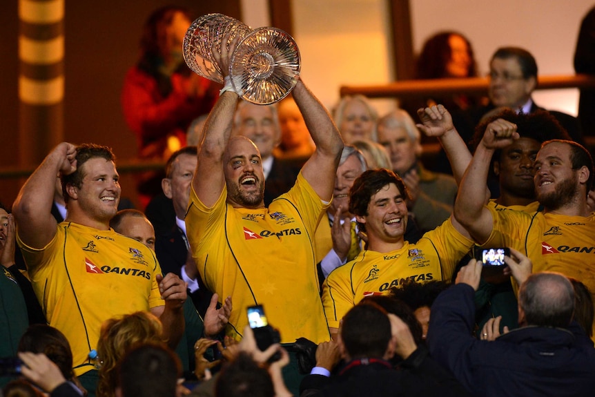 Twickenham glory ... Wallabies captain Nathan Sharpe lifts the Cook Cup.