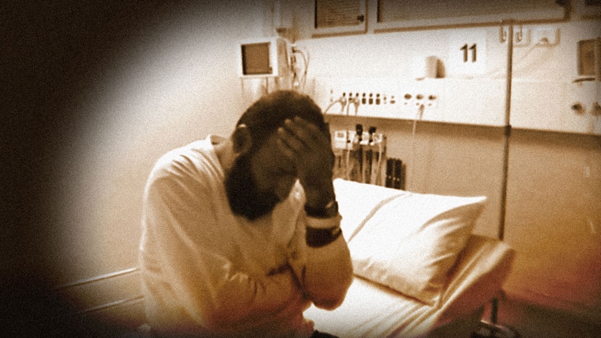 Man Haron Monis being interviewed in hospital by police