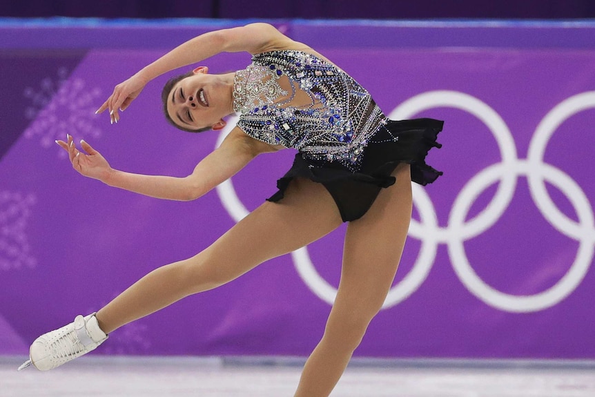 Figure skater mid performance.