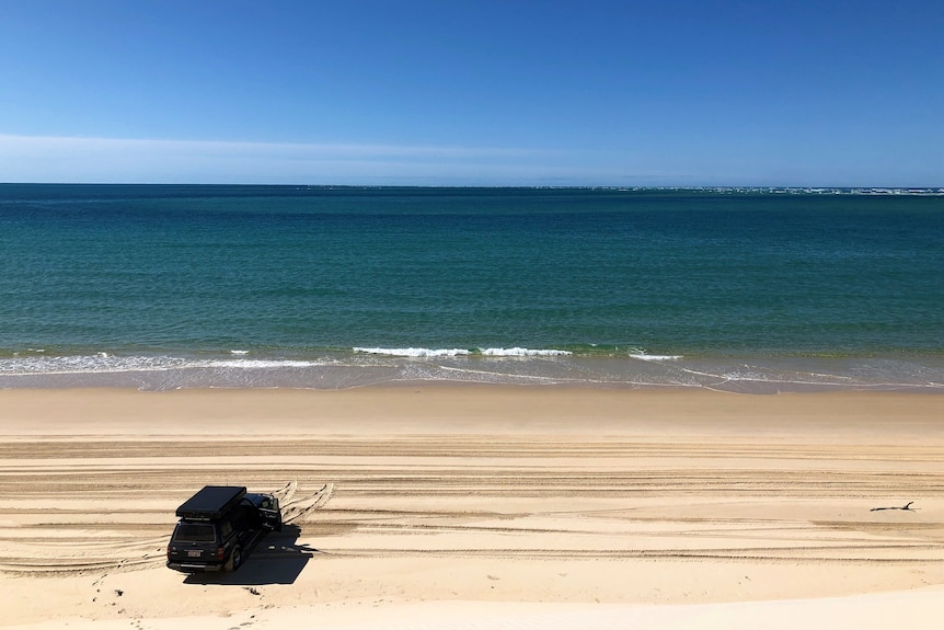A 4WD on a beach
