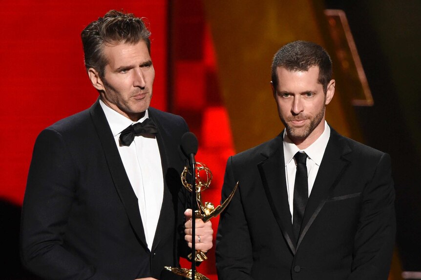 David Benioff and DB Weiss accept an award at the Emmys