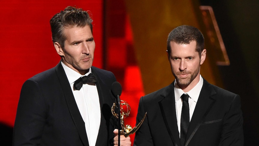 David Benioff and DB Weiss accept an award at the Emmys