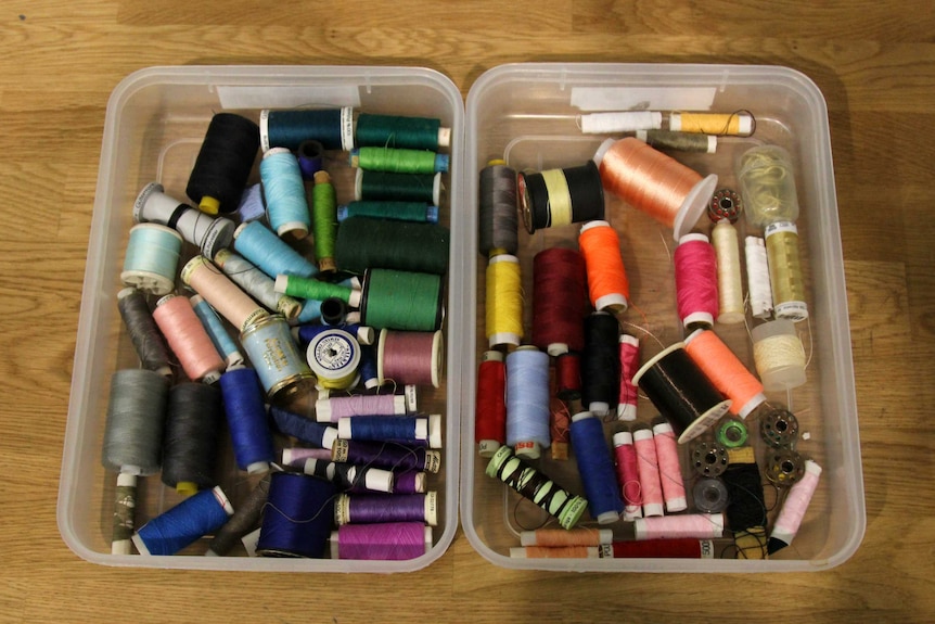 Sewing threads in a box.