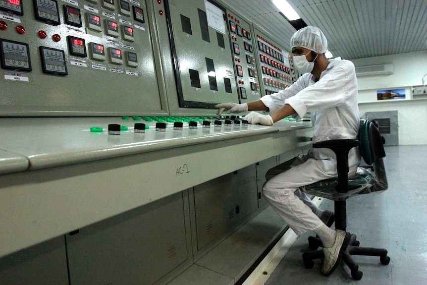 A technician works at Iran's Uranium Conversion Facility