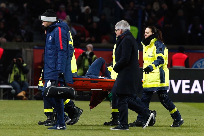 PSG's Neymar leaves the pitch on a stretcher after being injured against Marseille in Ligue 1.