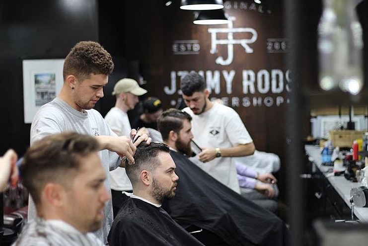 Men getting their haircut at a Brisbane barbershop