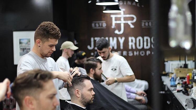 Men getting their haircut at a Brisbane barbershop