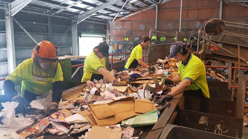 Bundaberg recycling workers sorting waste