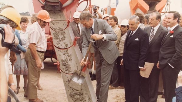 Prime Minister Malcom Fraser pouring the first concrete for Parliament House, November 1981.