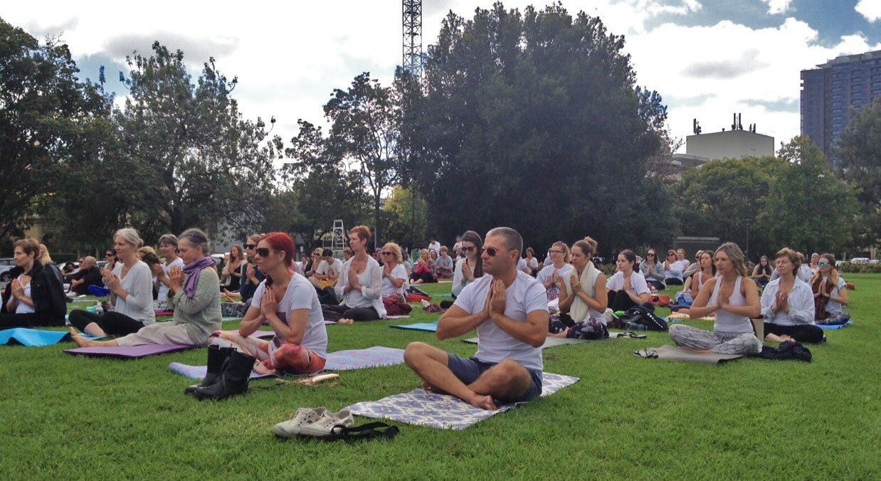 International Yoga Day celebrated with meditation and exercise in Adelaide park lands ABC News