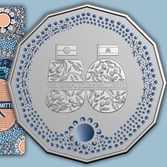 decorative fifty cent piece with 50 in teh middle and blue border and blue card to the left