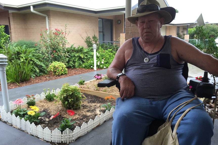 Resident, Graham Crowe, outside a new unit block in James Street, Windale.