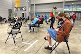 People waiting for vaccination at the Brisbane convention centre