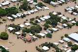 Floodwaters surround houses in the Lakes Creek area of Rockhampton
