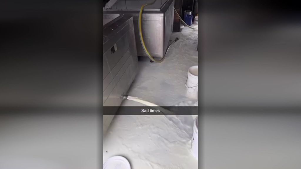 Dairy farmer isolated by floods forced to dump his milk - ABC News