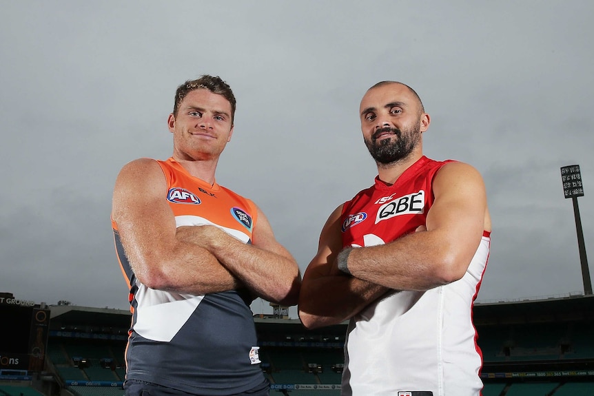 Heath Shaw of the Giants and Rhyce Shaw of the Swans pose at the SCG in April 2015.