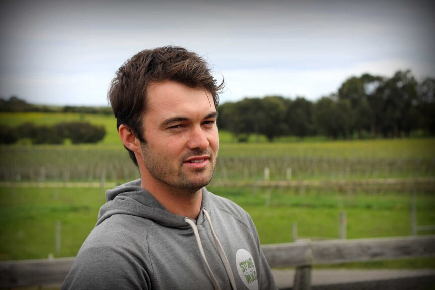 Brewer Tom O'Reilly at an organic orchard in Cape Jaffa, south-east South Australia.