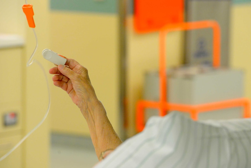 Woman in a hospital bed