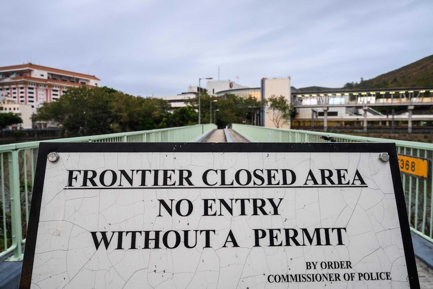 A notice at a border check point between Hong Kong and Shenzhen on February 6