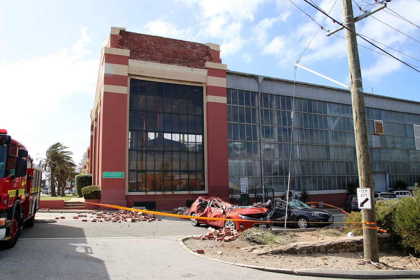 Crushed cars outside the Matilda Bay Brewing Company in North Fremantle with a fire truck at far left.