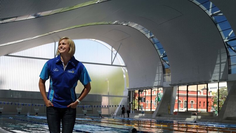 Olympic swimmer Libby Trickett poses for photographers at the Ian Thorpe Aquatic Centre