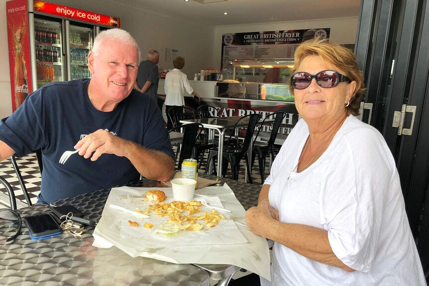 Diane and Brian Smith at cafe with fish and chips at Burleigh.