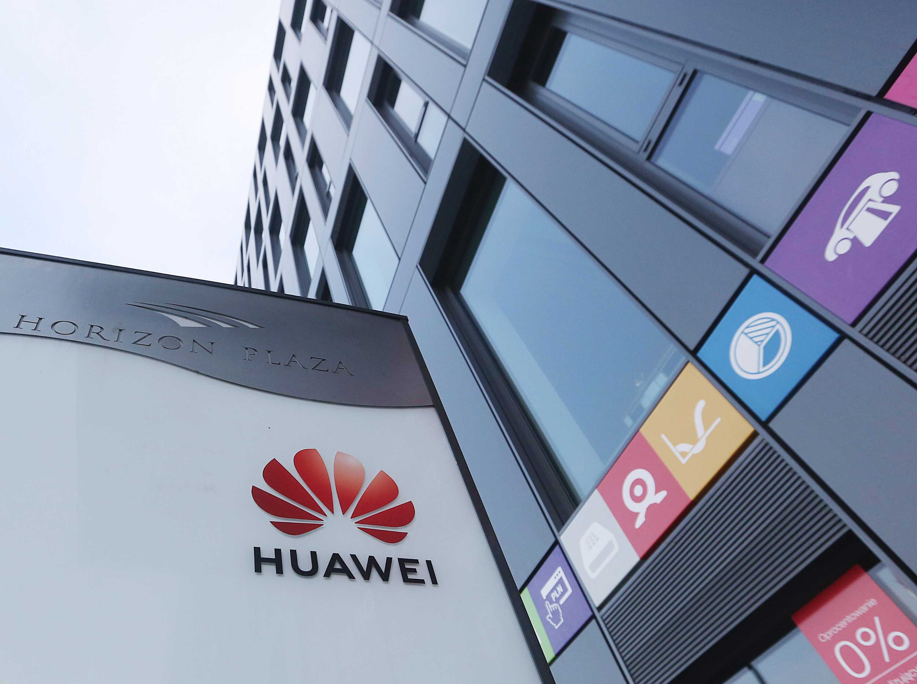 The Huawei logo is displayed in red and black at the main office of Chinese tech giant Huawei