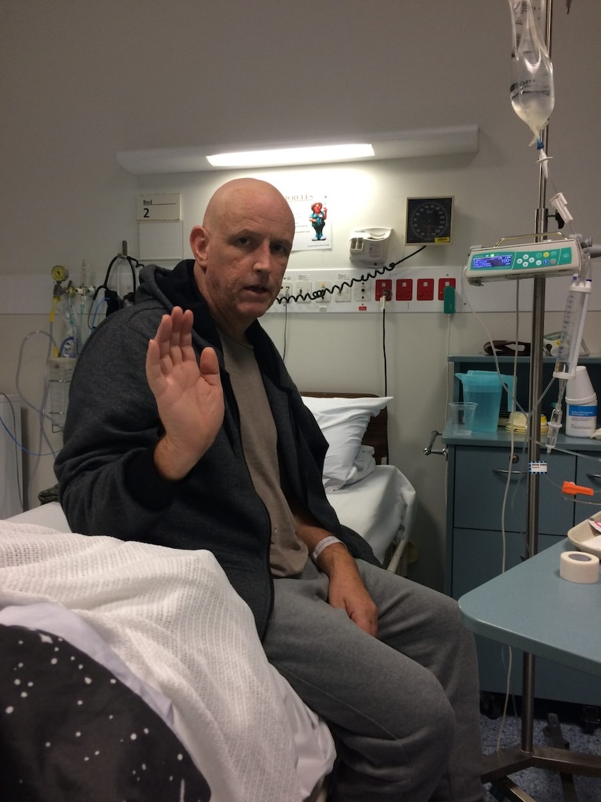 man in hospital bed undergoing treatment for Leukaemia