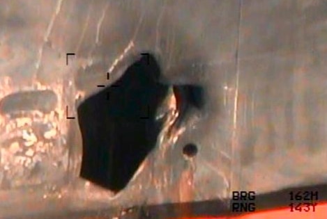 A large hole in the side of a vessel.