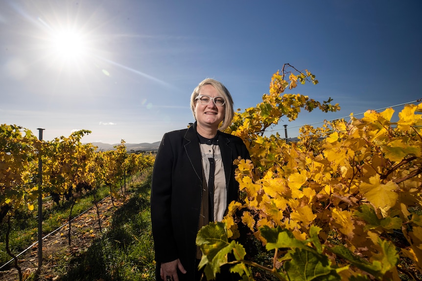 woman standing in vineyard