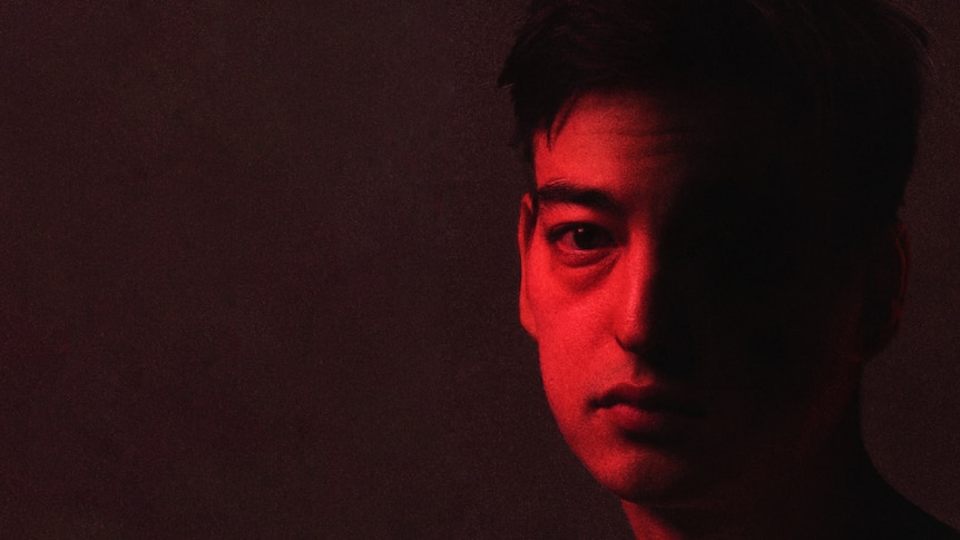 JOJI's Nectar album artwork; subject flooded with red light