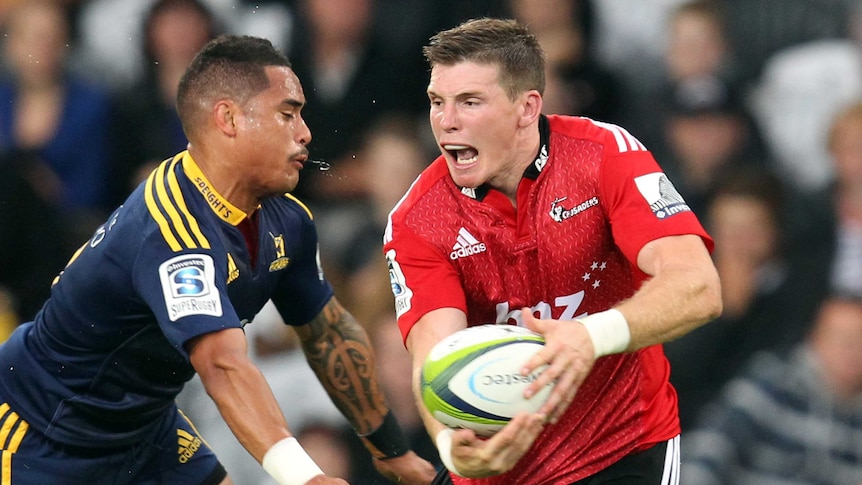 Colin Slade looks to run the ball for Crusaders