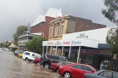 Flash flooding in Broken Hill's Argent Street after a severe storm.