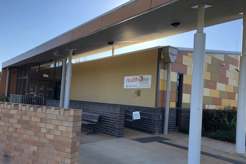 A plain looking brick medical building in a country town.