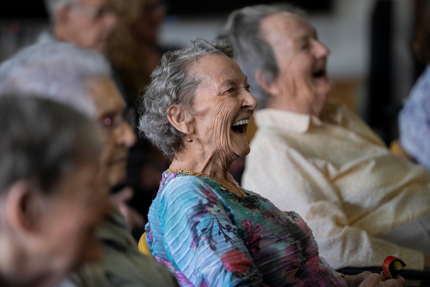 Aged care residents laughing.
