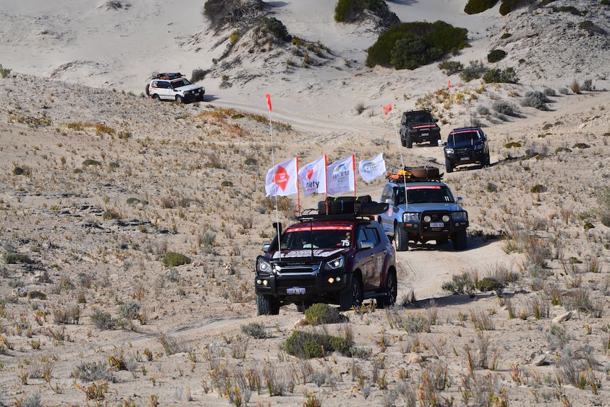 five 4wd driving in sand dunes 