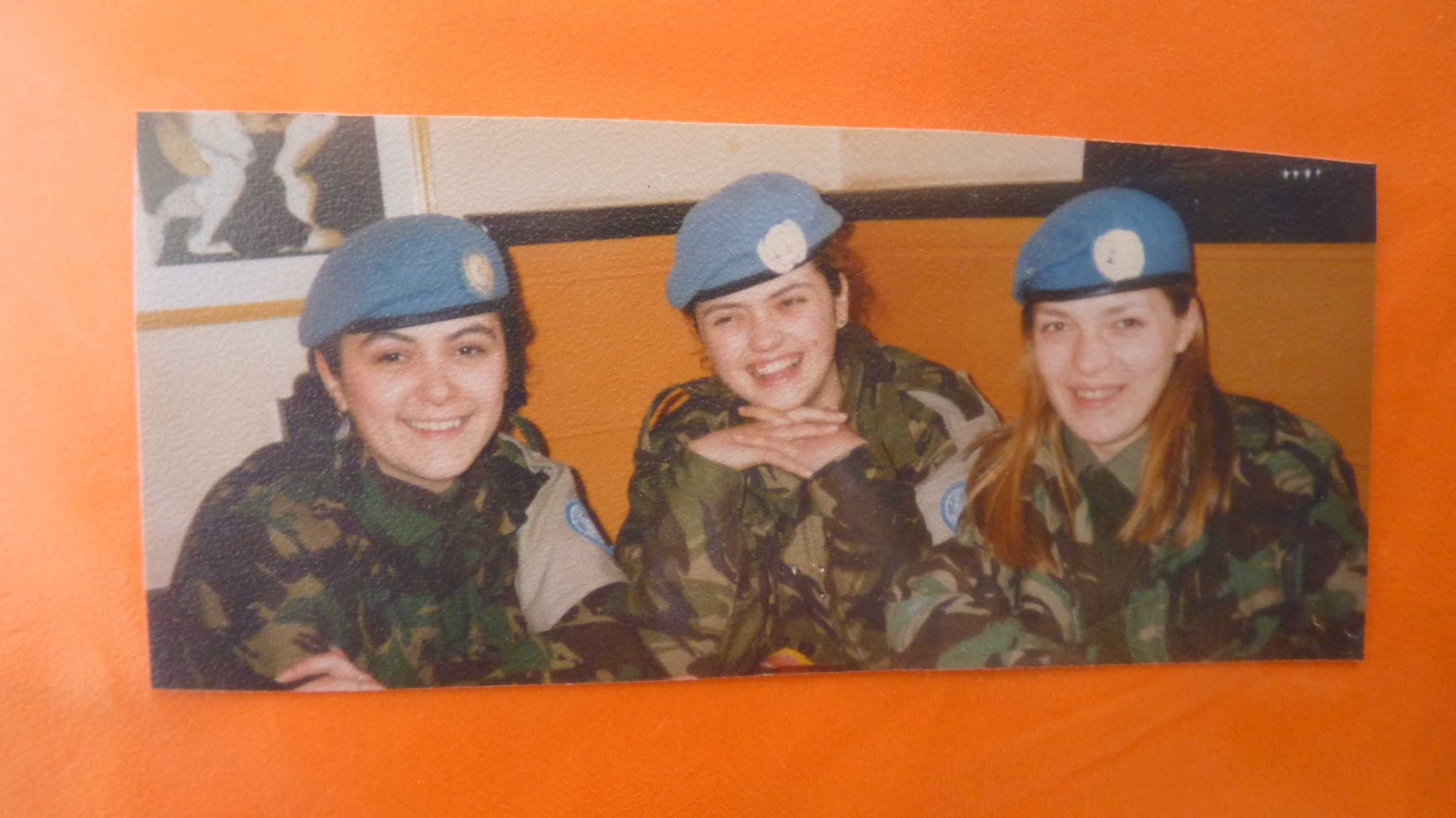An archival photo of three women in UN uniform.