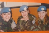An archival photo of three women in UN uniform.