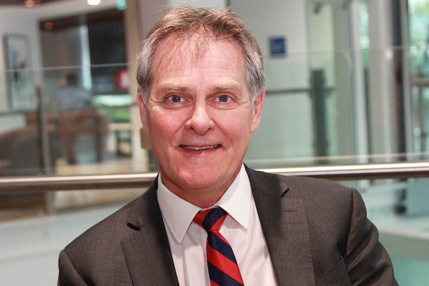 Torrens University Vice Chancellor Justin Beilby smiles at the camera.