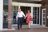 Chris Deutrom leaves the NT Supreme Court with his wife Helen on November 8, 2018.