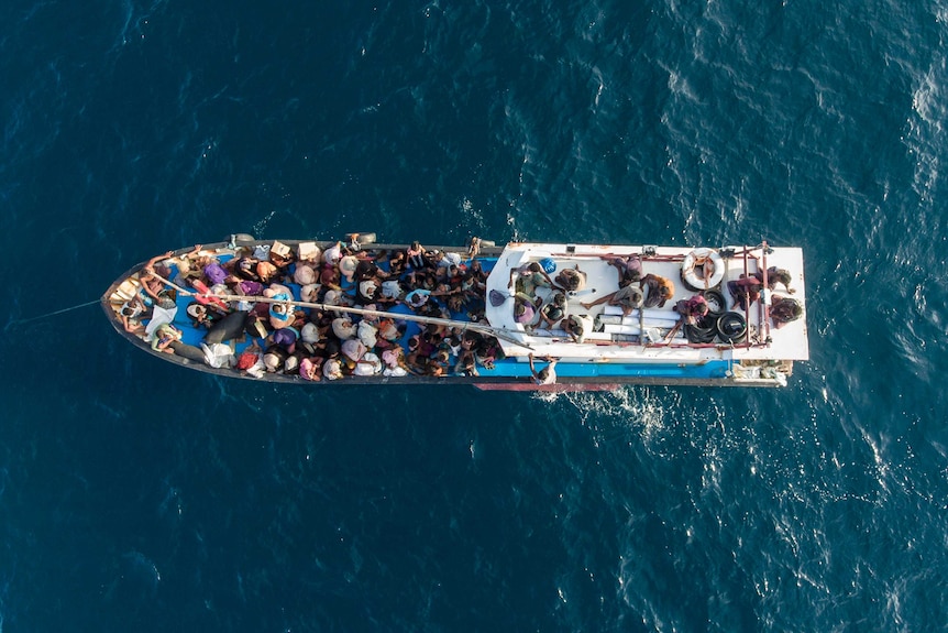 This drone shot shows a boat carrying ethnic-Rohingya Muslims from above.