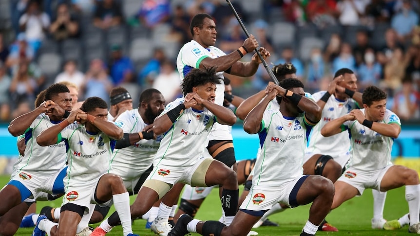 Players from a rugby union team in the Pacific perform a war dance before a game