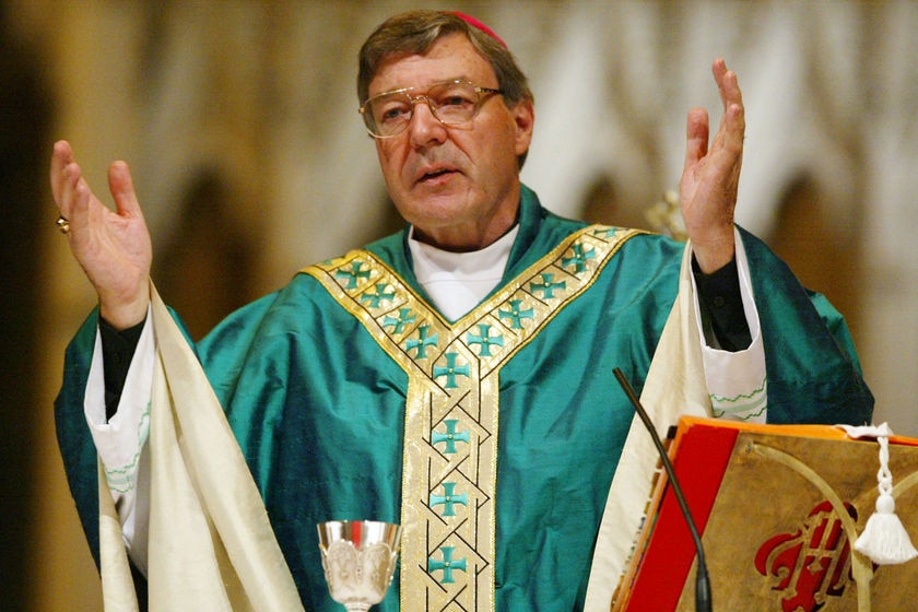 Archbishop George Pell, hands out, during Mass  (Reuters, file photo)