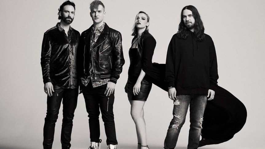 US hard rock group Halestorm. Photo of four people in black and white.