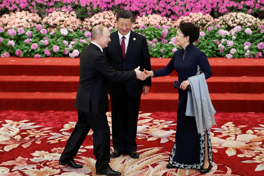 Vladimir Putin, Xi Jinping and Peng Liyuan