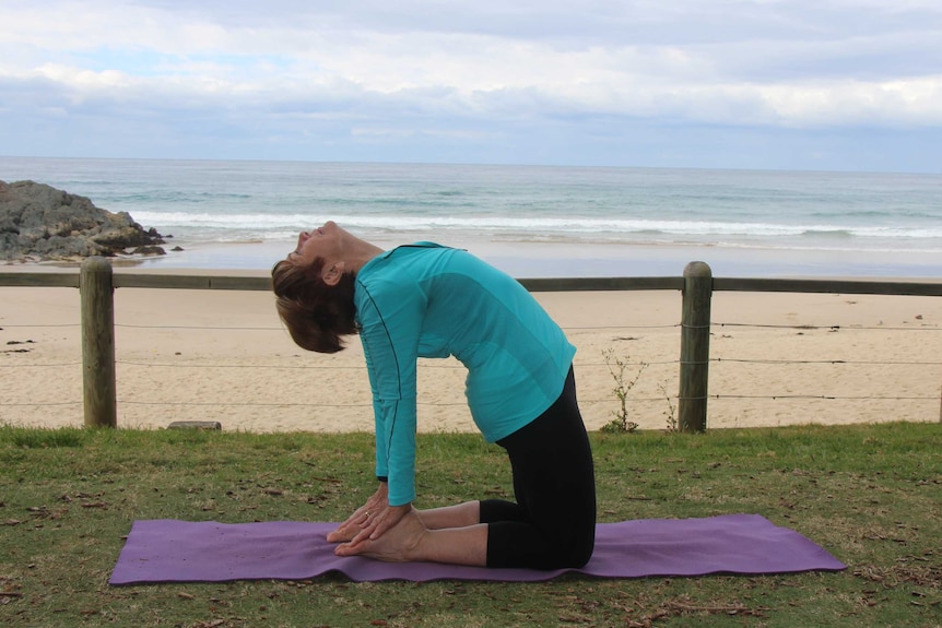 Heather Eldridge, beach yoga.