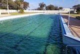 A swimming pool where the water has has turned green due to a lake of chlorine in Lake Grace.