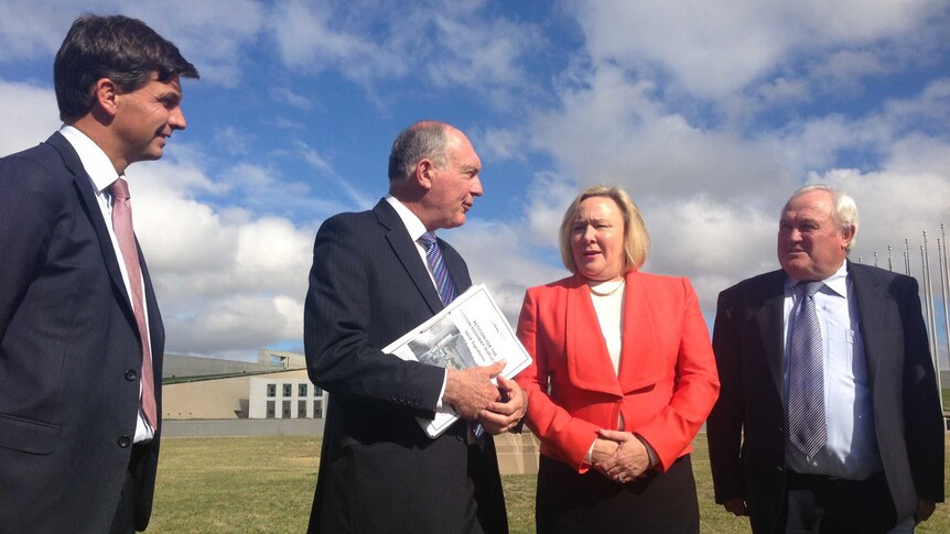 Yass Valley Council Mayor Rowena Abbey handed a petition to Federal Opposition transport spokesman Warren Truss.